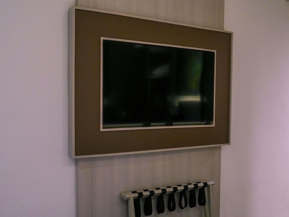 Habitación Deluxe con Dos Camas Individuales y Balcón (Hasta 2 Adultos y 1 Niño) del hotel Mercure Kuta Bali. Foto 4