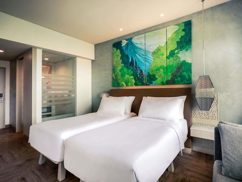 Habitación Deluxe con Vistas al Mar y Dos Camas Individuales (Hasta 2 Adultos y 1 Niño) del hotel Mercure Kuta Bali. Foto 5