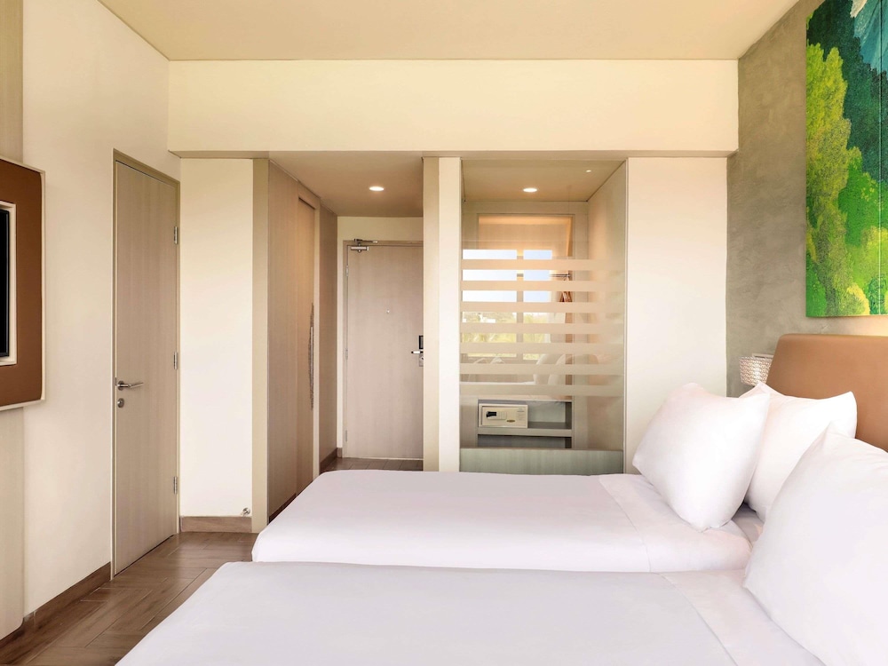 Habitación Deluxe con Vistas al Mar y Dos Camas Individuales (Hasta 2 Adultos y 1 Niño) del hotel Mercure Kuta Bali. Foto 6