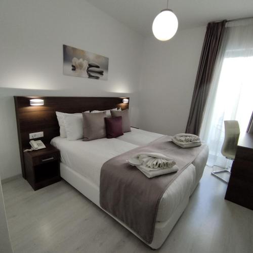 Habitación Doble Grande del hotel International Atene. Foto 7