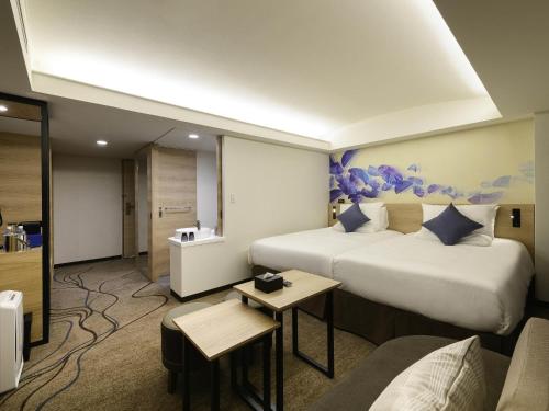 Habitación Deluxe Ejecutiva, Camas Gemelas y Terraza - No Fumador del hotel Novotel Okinawa Naha