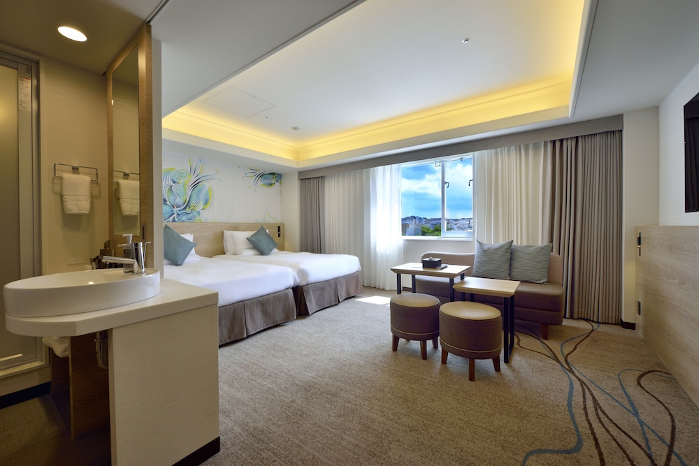 Habitación Deluxe Ejecutiva, Camas Gemelas - No Fumador del hotel Novotel Okinawa Naha. Foto 1