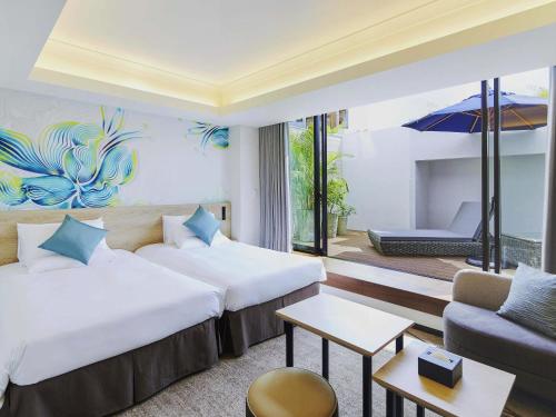 Habitación Deluxe Ejecutiva, Camas Gemelas y Terraza - No Fumador del hotel Novotel Okinawa Naha