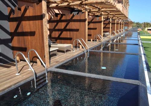 Habitación Deluxe con piscina privada del hotel Lopesan Baobab Resort. Foto 2