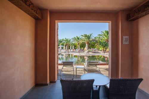 Alojamiento Familiar Doble con piscina del hotel Lopesan Baobab Resort. Foto 2