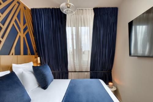 Habitación Deluxe del hotel Artemisia Montmartre. Foto 4
