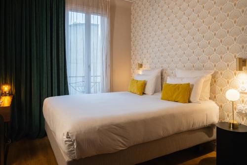 Habitación Clásica del hotel Artemisia Montmartre. Foto 11
