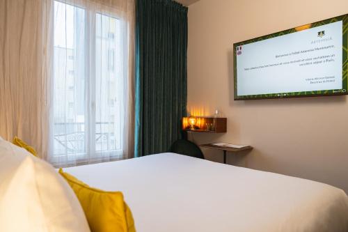 Habitación Clásica del hotel Artemisia Montmartre. Foto 19