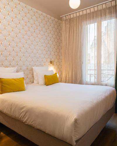 Habitación Clásica del hotel Artemisia Montmartre. Foto 21