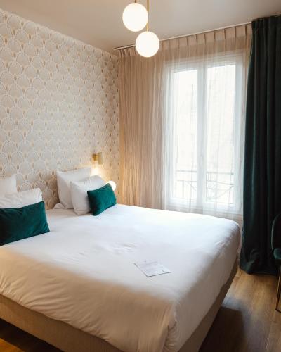 Habitación Clásica del hotel Artemisia Montmartre. Foto 22