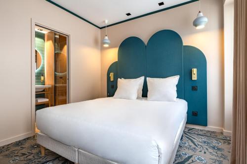 Habitación Triple del hotel O.lysée