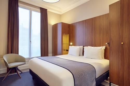 Habitación Premium con cama extragrande y vistas a la ciudad del hotel Holiday Inn Paris Gare de Lyon Bastille. Foto 5