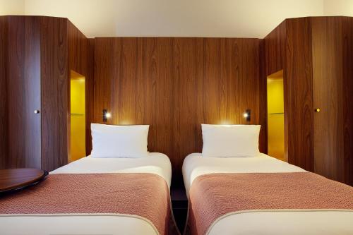 Habitación Doble Estándar - 2 camas del hotel Holiday Inn Paris Gare de Lyon Bastille. Foto 6
