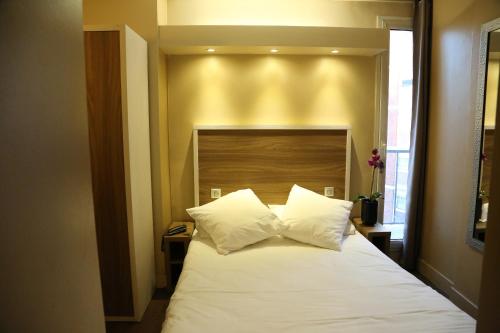 Habitación Doble Básica con ducha del hotel Grand Nouvel Opera. Foto 4