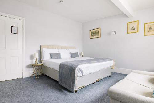 Habitación con cama extragrande. del hotel The Abbey Notting Hill. Foto 3