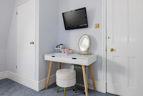 Habitación Loft con cama extragrande del hotel The Abbey Notting Hill