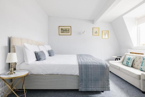 Habitación Loft con cama extragrande del hotel The Abbey Notting Hill. Foto 3