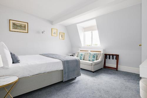 Habitación Loft con cama extragrande del hotel The Abbey Notting Hill. Foto 6