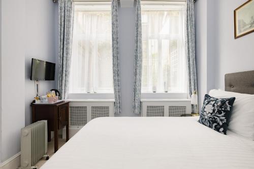 Habitación Doble - Planta baja del hotel The Abbey Notting Hill. Foto 2