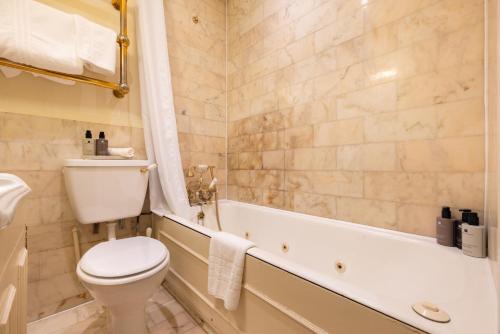 Suite Junior del hotel The Abbey Notting Hill. Foto 3