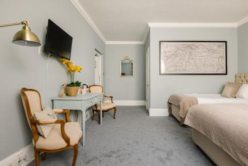 Planta baja - Habitación Familiar Estándar del hotel The Abbey Notting Hill