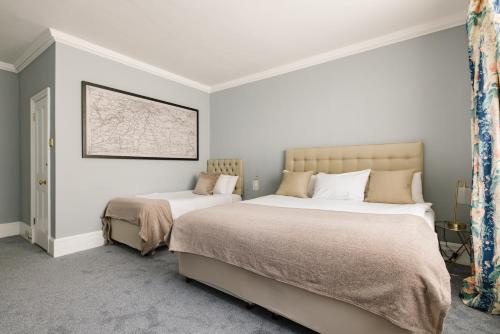 Planta baja - Habitación Familiar Estándar del hotel The Abbey Notting Hill. Foto 4