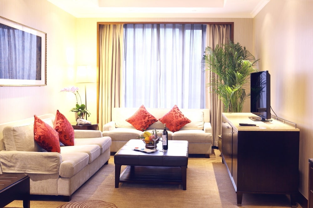 Suite Ejecutiva con 1 cama King Size del hotel Grand Mercure Beijing Central. Foto 1