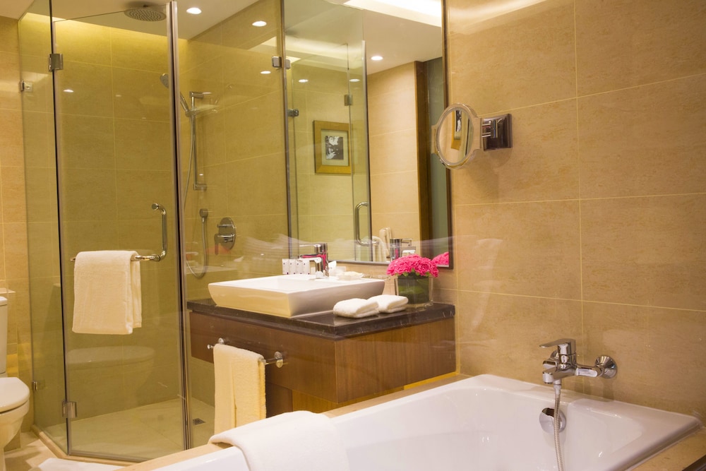 Habitación ejecutiva con 2 camas individuales del hotel Grand Mercure Beijing Central. Foto 3