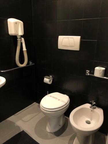 Habitación Triple Confort del hotel Paris. Foto 13