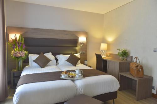 Habitación Doble - 1 o 2 camas del hotel Unic Renoir Saint Germain. Foto 4