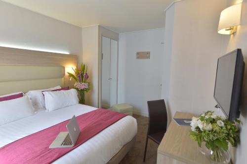 Habitación Doble - 1 o 2 camas del hotel Unic Renoir Saint Germain. Foto 6