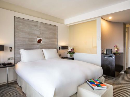 Habitación de lujo - 1 cama extragrande del hotel Sofitel Brussels Europe. Foto 2