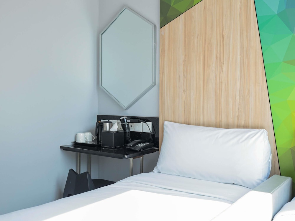 Habitación superior con 2 camas individuales del hotel Ibis Budget Singapore Ametrine (sg Clean). Foto 2