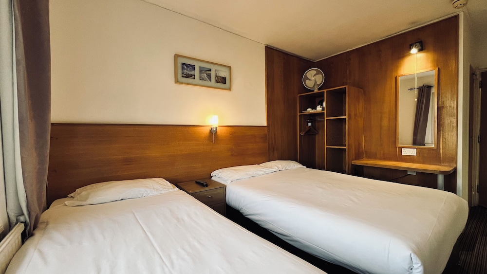 Habitación triple del hotel Arriva