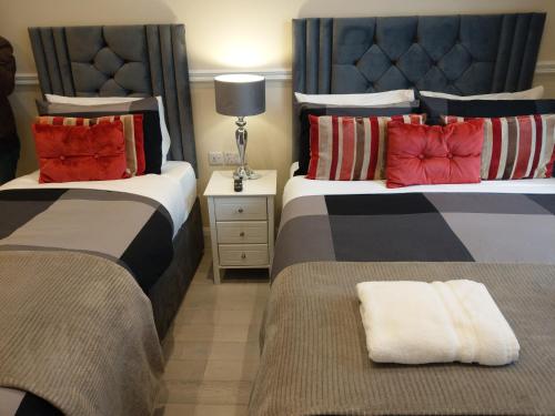 Habitación Triple del hotel Prime Inn. Foto 1