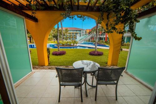 Habitación de lujo con vistas a la piscina del hotel Enotel Porto De Galinhas
