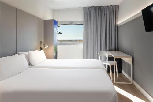 Habitación Doble - 2 camas del hotel B&B Valencia Aeropuerto. Foto 1