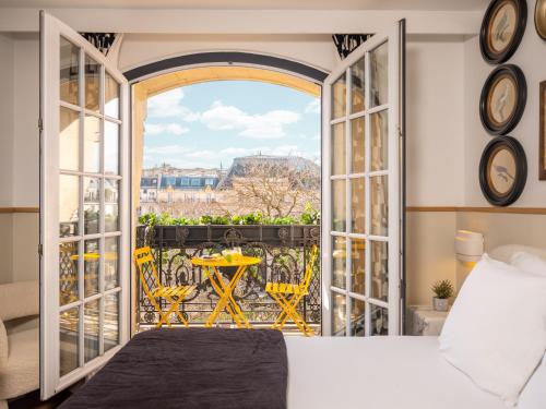 Habitación Doble Confort con balcón y vistas a París del hotel Solly. Foto 4