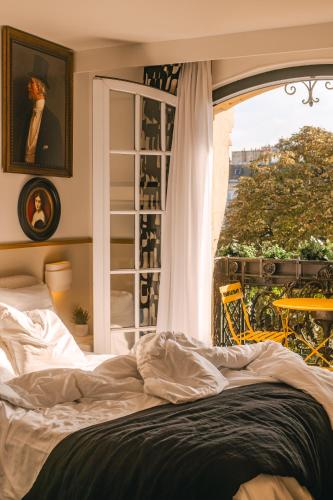 Habitación Doble Confort con balcón y vistas a París del hotel Solly. Foto 6