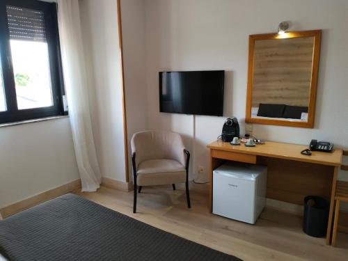 Suite Deluxe con cama extragrande del hotel Helmántico