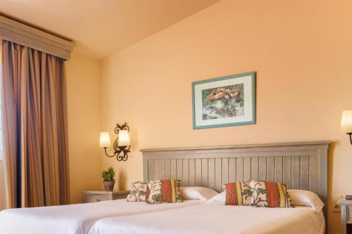 Habitación Doble Deluxe (2 adultos + 1 niño) del hotel Royal Suite. Foto 1