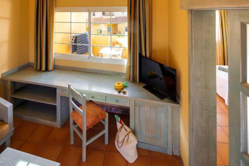 Habitación Cuádruple Clásica del hotel Royal Suite. Foto 3