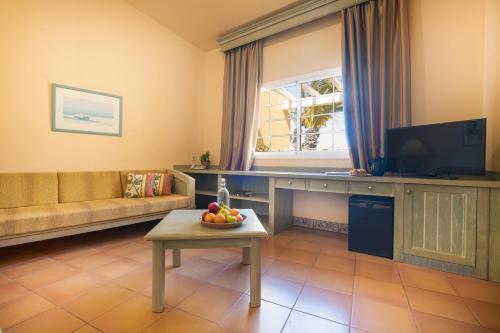 Habitación Cuádruple Clásica del hotel Royal Suite. Foto 7