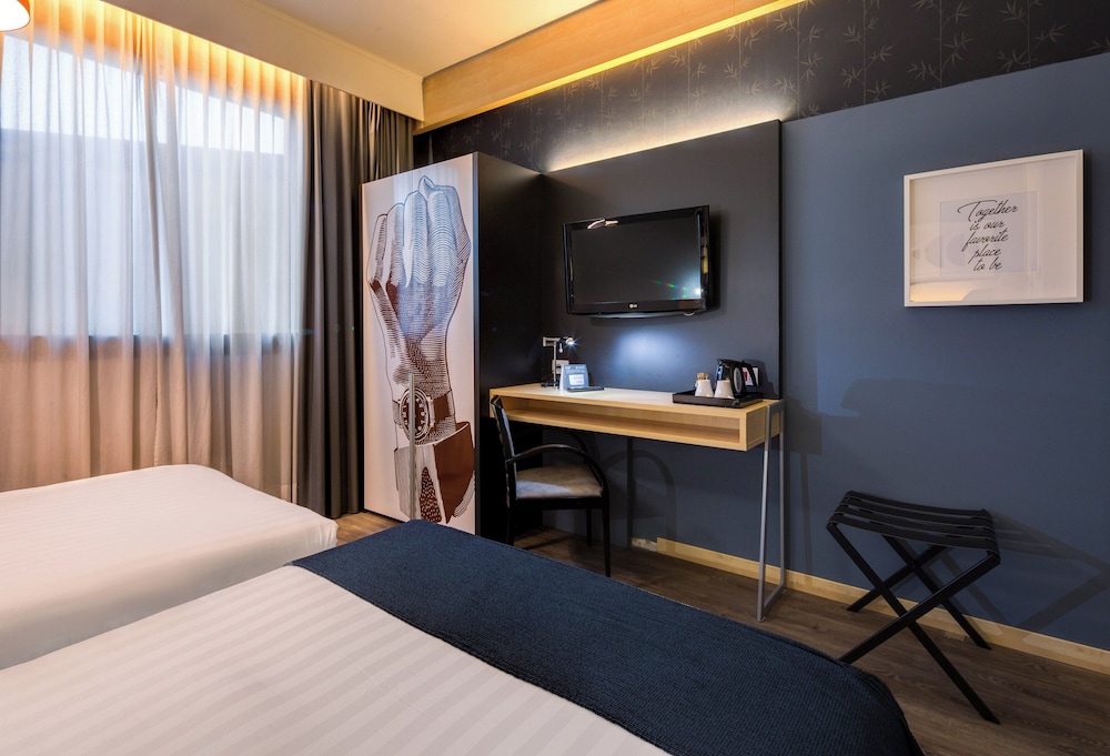 Habitación estándar, 1 cama doble con sofá cama del hotel Holiday Inn Bologna-Fiera. Foto 13