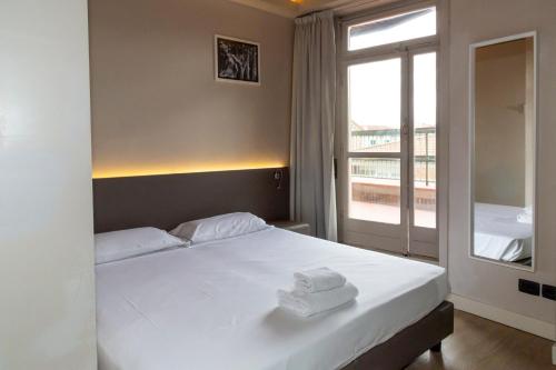 Habitación Doble Estándar del hotel Plus Florence. Foto 3