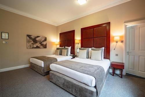 Habitación Cuádruple Confort del hotel Grange Beauchamp. Foto 5