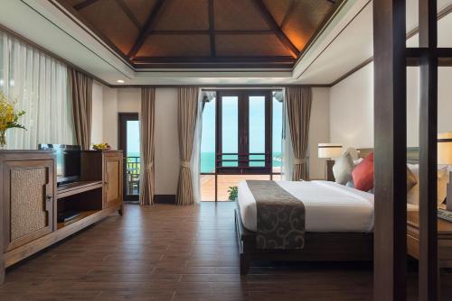 Habitación Doble Deluxe con vistas al mar del hotel Nora Buri Resort and Spa. Foto 7