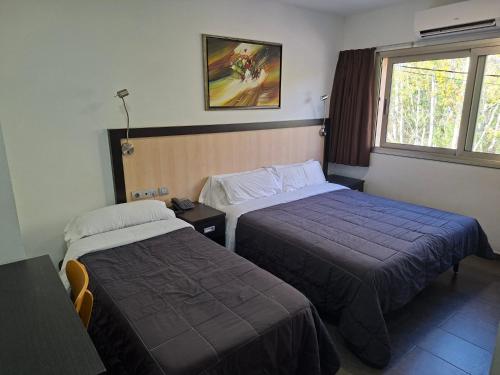 Habitación Triple Confort del hotel 170. Foto 2