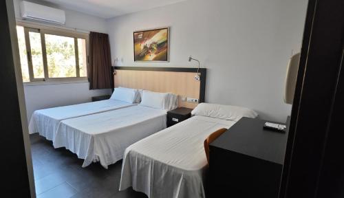 Habitación Triple Confort del hotel 170. Foto 6