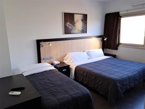 Habitación Triple Confort del hotel 170. Foto 7